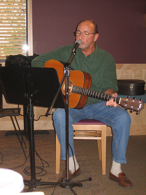 Todd Dolan playing guitar