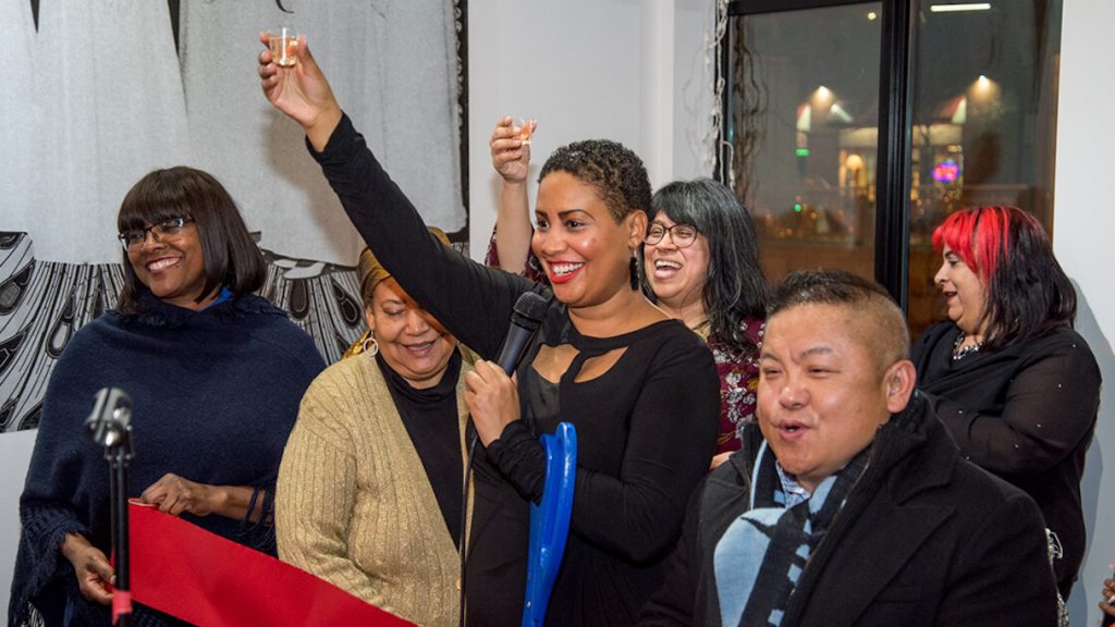 Raeisha Williams toasts the opening of Heritage Tea House