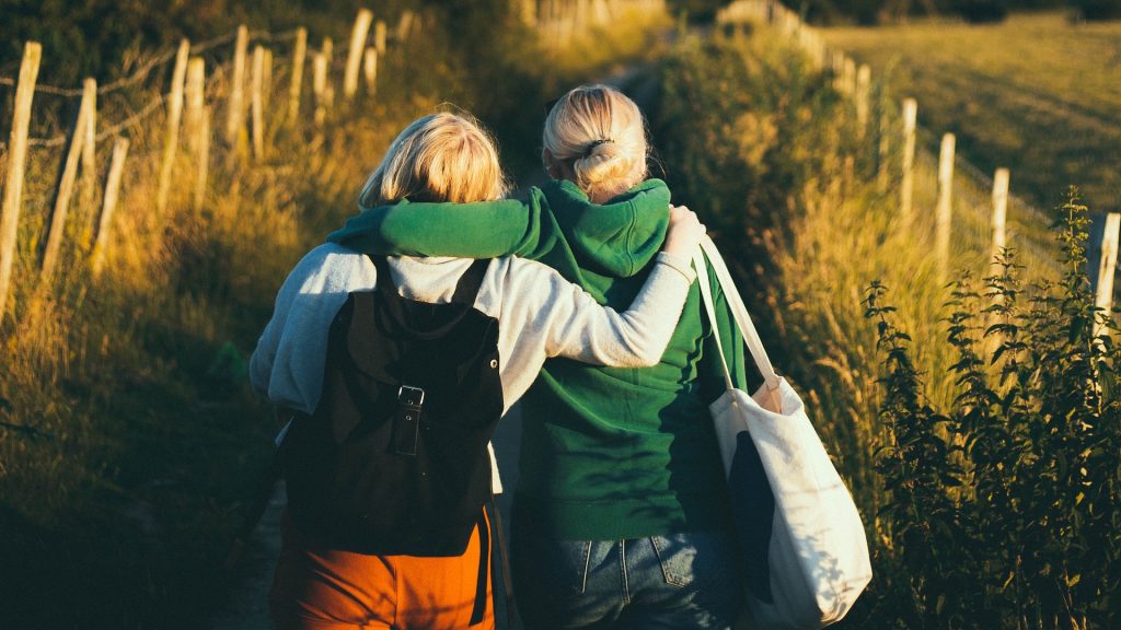 Two People Comforting Each Other