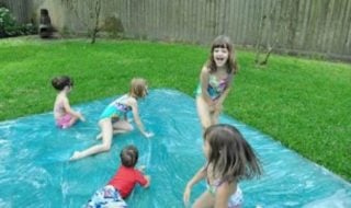 Water blob activity with kids playing