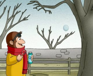 Curious George blowing bubbles