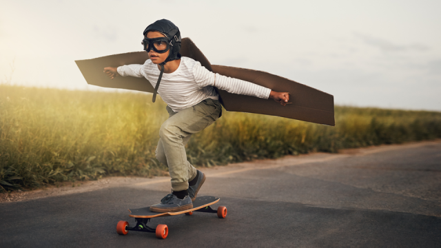 Boy in cardboard wings