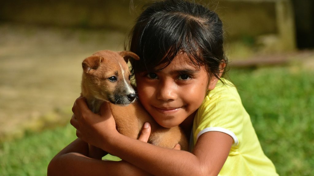 Young girl with a dog