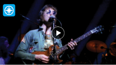 john lennon playing guitar