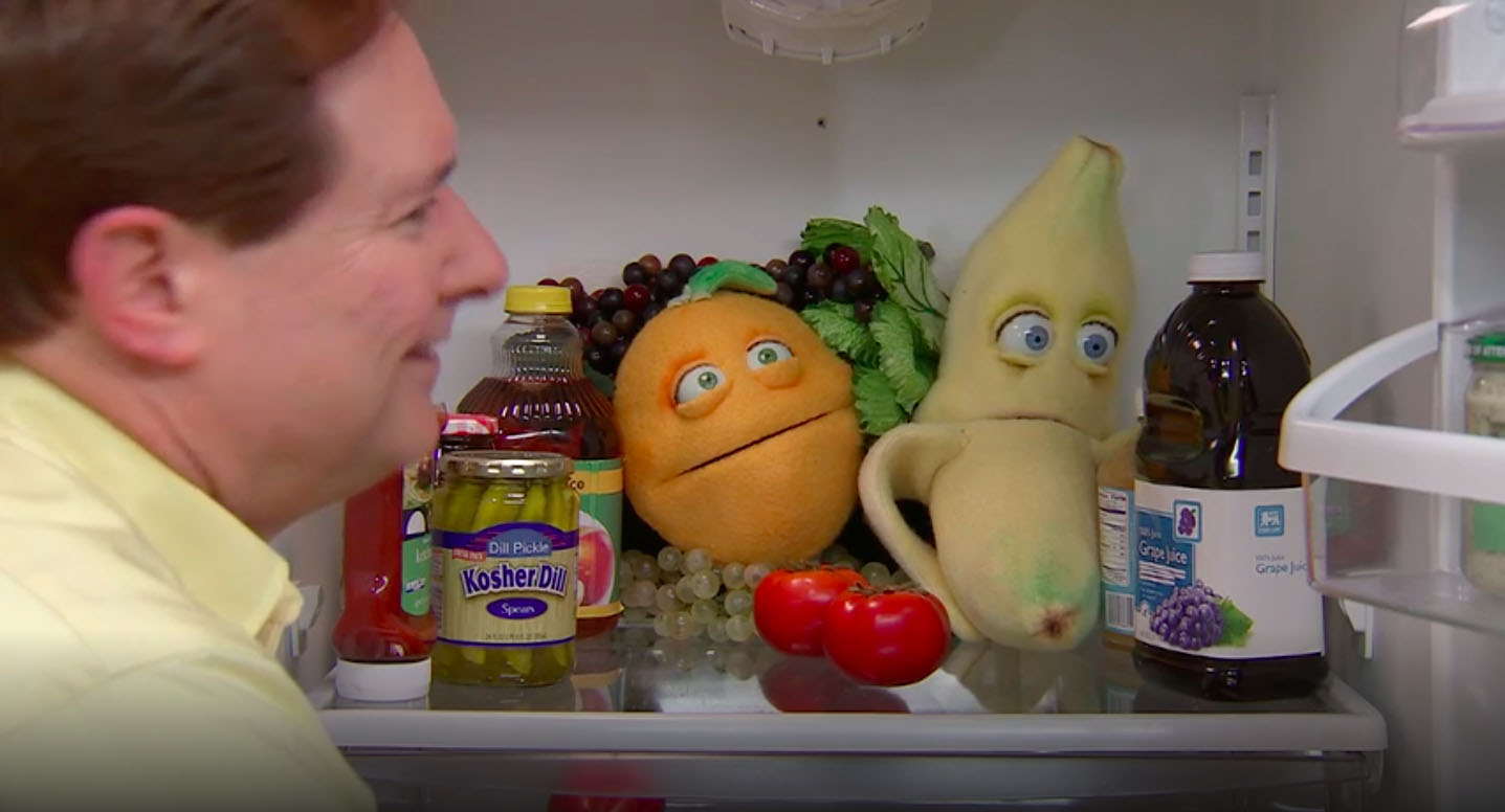 Fruit puppets in a fridge