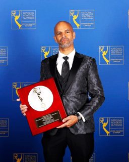 Daniel Bergin holding the Silver Circle award