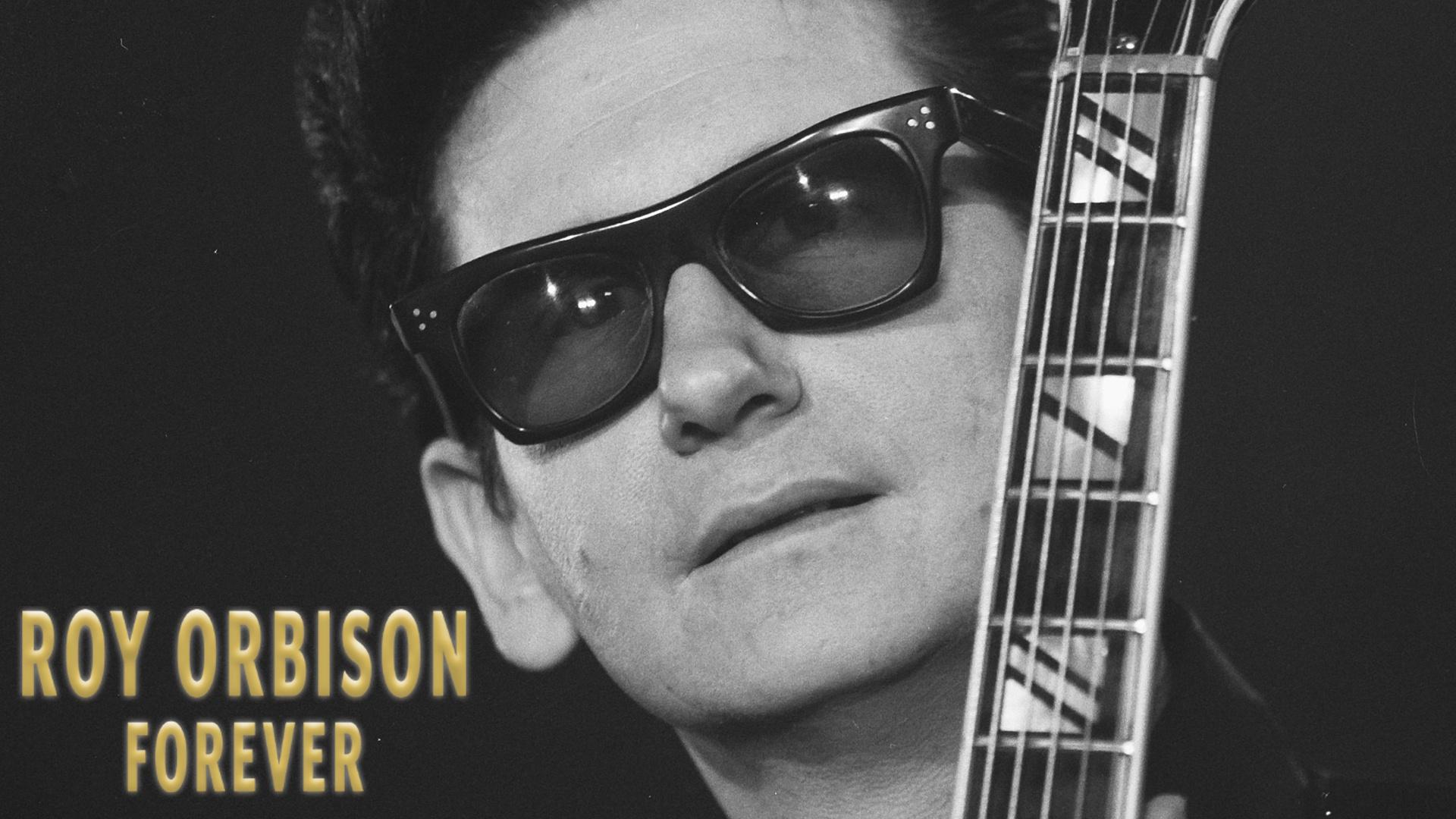 roy orbison with a guitar