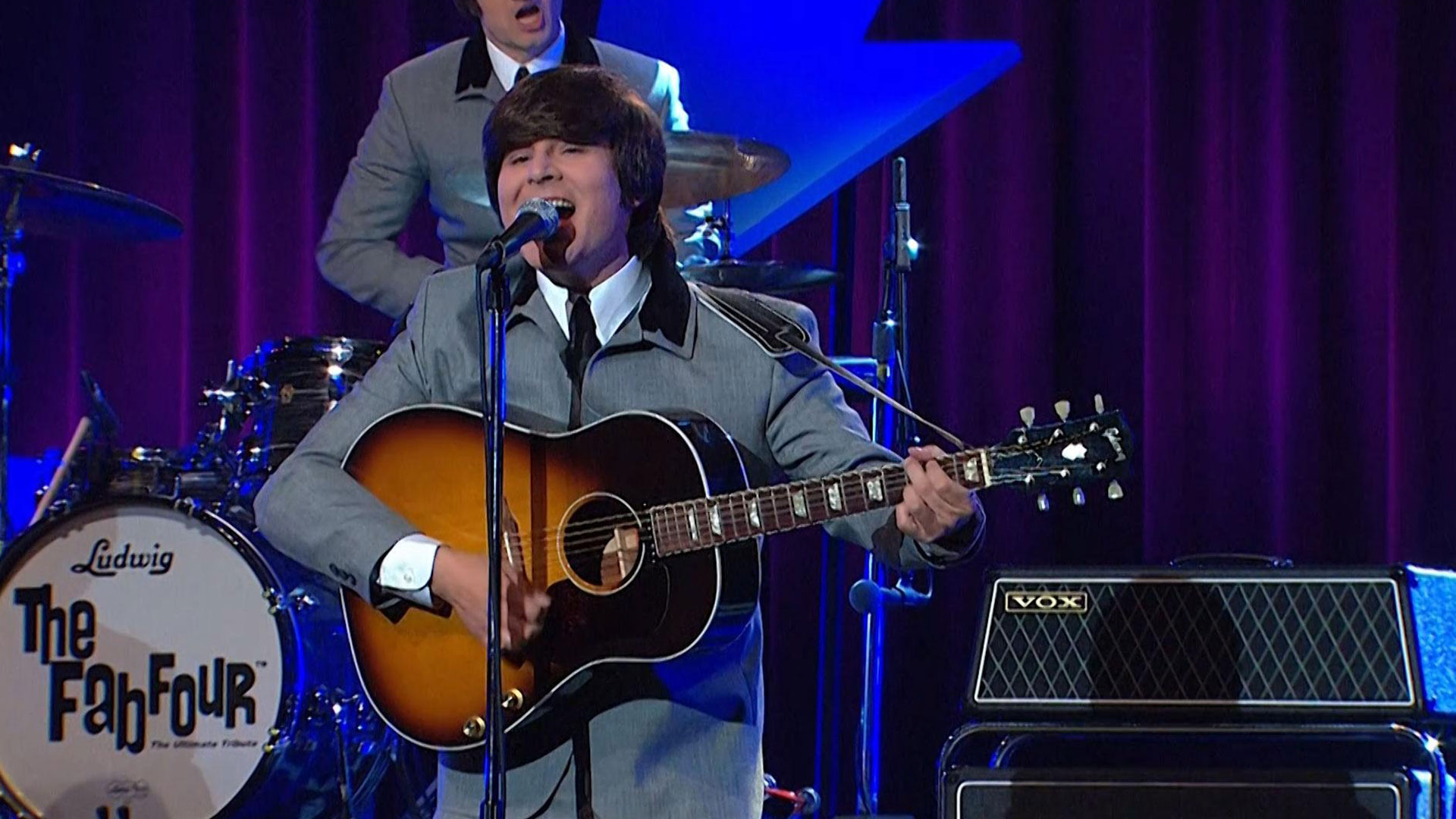 Beatles tribute band on stage