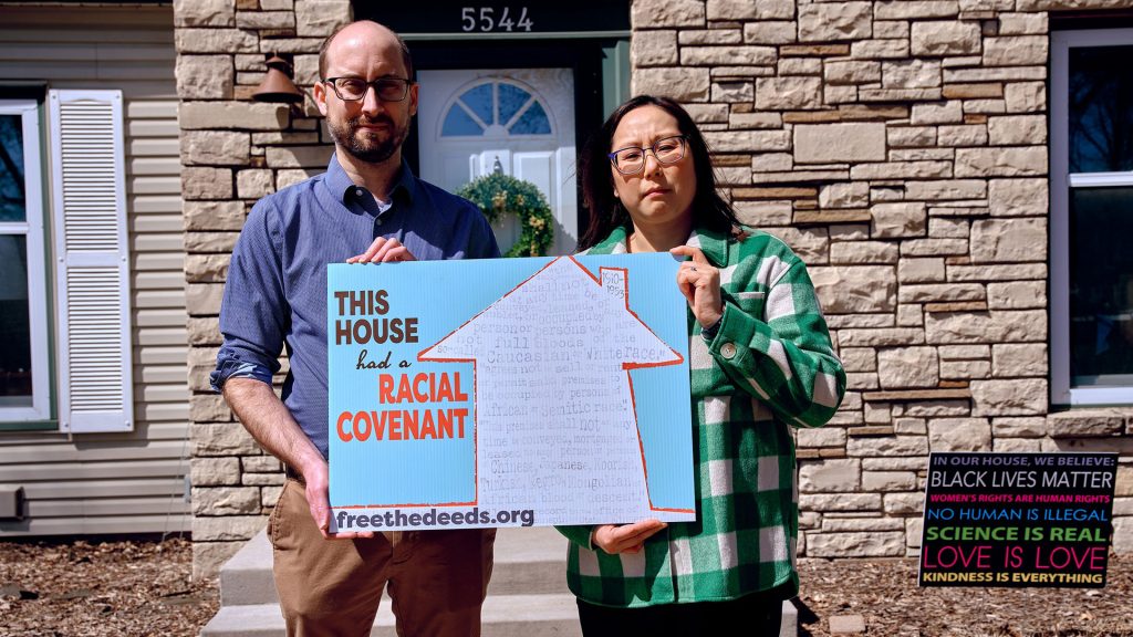 Katie and David with lawn sign